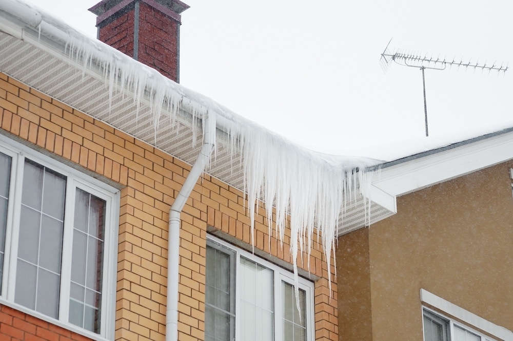Featured image for “Can Ice Damage Your Roof in the Winter?”