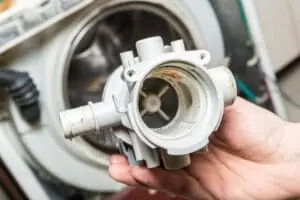 Repair-old-laundry-washer.-Old-water-pump-change-due-to-washing-machine-water-leaking
