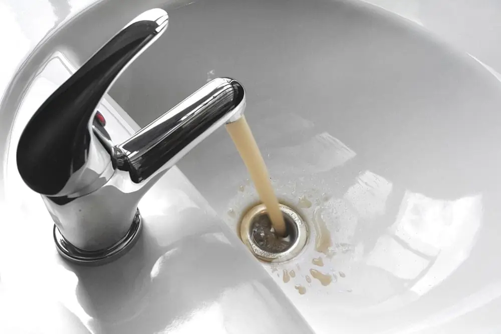 Black water coming out of a faucet